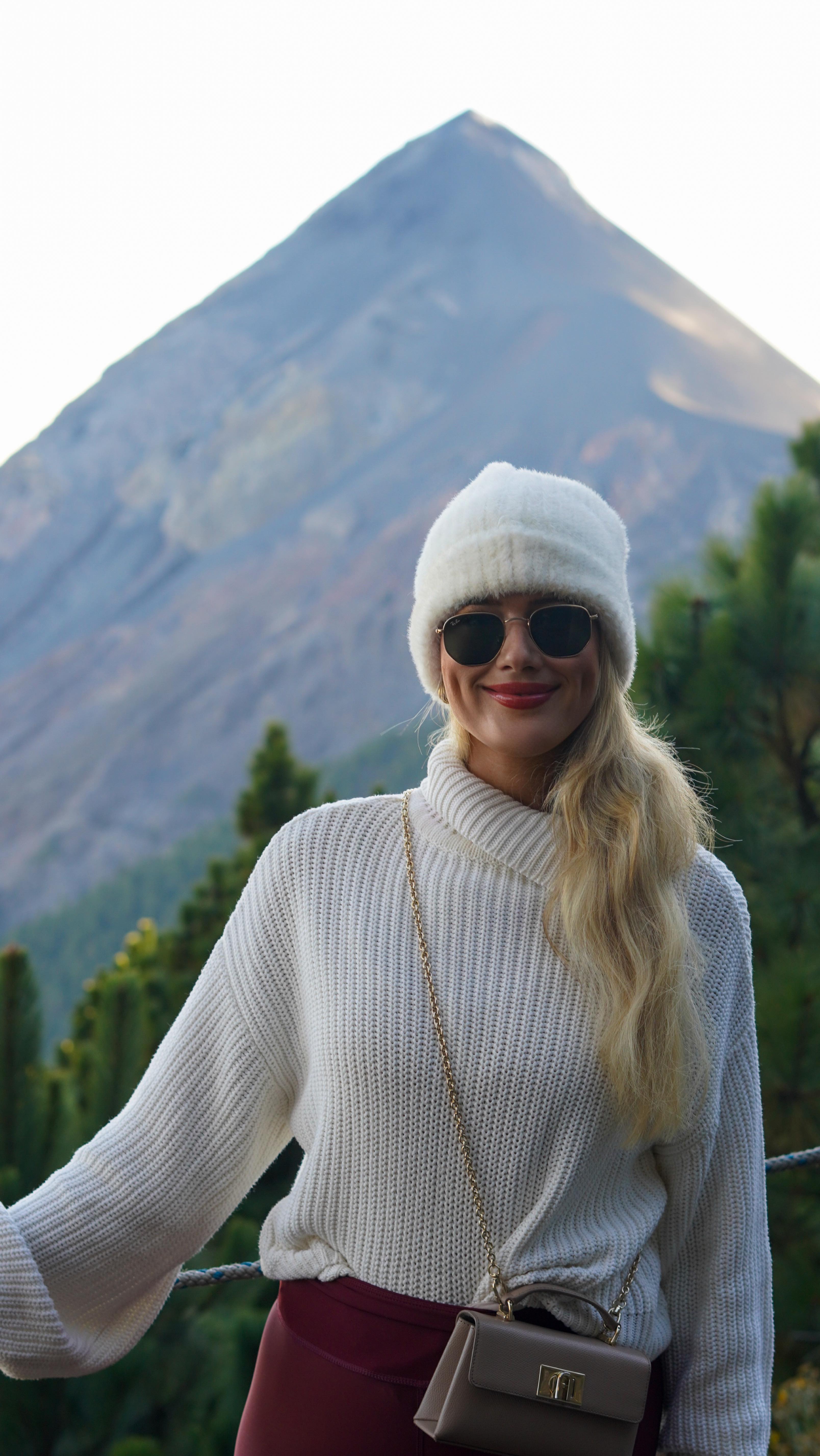 I almost gave up during the first hour of this volcano hike, but what I saw at the top changed everything 🌋 90 second vlog! ⏰

One of the hardest yet most rewarding things I’ve ever done while traveling.
A few weeks ago, I hiked a volcano, and it pushed me far outside my comfort zone, physically and mentally.

We started the day slow, with breakfast in beautiful Antigua, before being transported to the headquarters to gear up and mentally prepare. The first hour was brutal: steep, cold, and way less oxygen. I was close to quitting. But with lots of breaks, support from the group, and a porter for my backpack, it slowly got better.

This hike is no joke. Bring plenty of water, snacks, layers, walking sticks, and altitude pills; the climate and altitude differences really test you. At basecamp there was no water or electricity, so you truly go back to basics. Cold nights, thin air, and warm cacao shared with people from all around the world after a 4–5 hour climb.

I was completely exhausted, so the only extra hike I did was a short 20-minute climb to the viewpoint, and it was more than worth it. Seeing the volcano erupt every 10 minutes was unreal. One of the most mind-blowing experiences of my life. Even at night, waking up in our shared cabin, we could see it glowing in the dark.

The next morning, after coffee and breakfast, we started the descent. About 2.5 hours down - fast, music in my ears, and honestly… pure fun.

This hike reminded me that the hardest paths often lead to the most unforgettable moments.

Would you try this? 🌋✨
Let me know in the comments.

#guatemala #solotravel #acatenango #volcano #hike #adventure #solofemaletravel
#stewardess #flightattendant #cabincrew #cabinattendant #pageantqueen #guatemala #antigua  #model  #missnetherlandsfinalist #beautypageant  #travelblogger #solotravel #solotravelblog #femaletravel